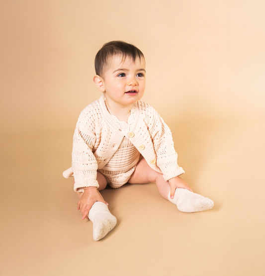 Set cardigan e pagliaccetto in maglia di cotone